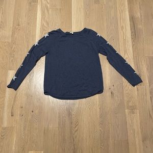 Dark blue sweater with gray stars on the side of sleeves